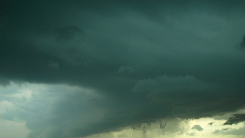 Figure 2: A lowered, rotating wall cloud is visible on the far right. Taken looking south from Hanston, KS